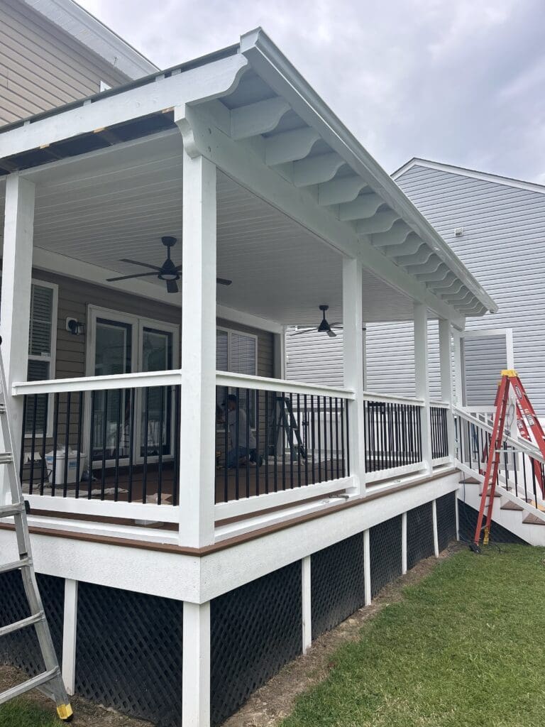 Covered porch with railing built by B&B Decks in Hampton Roads, VA