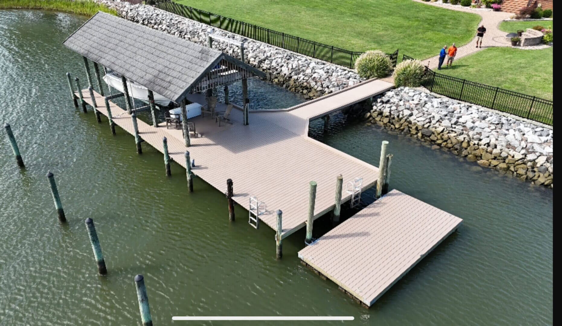 Waterfront-style composite deck by B&B Decks — Suffolk, VA service area