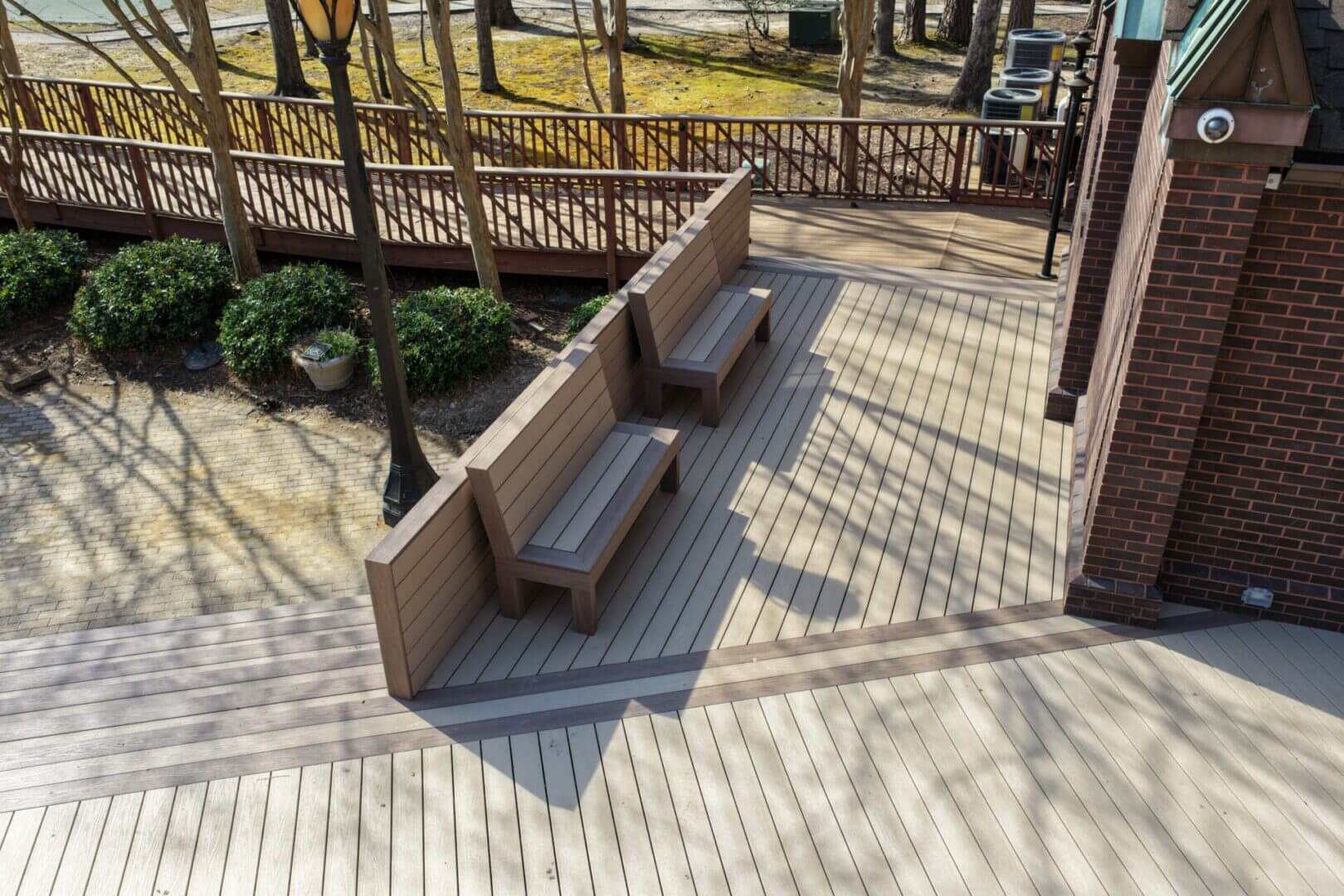 Custom deck with built-in benches by B&B Decks serving Suffolk, VA