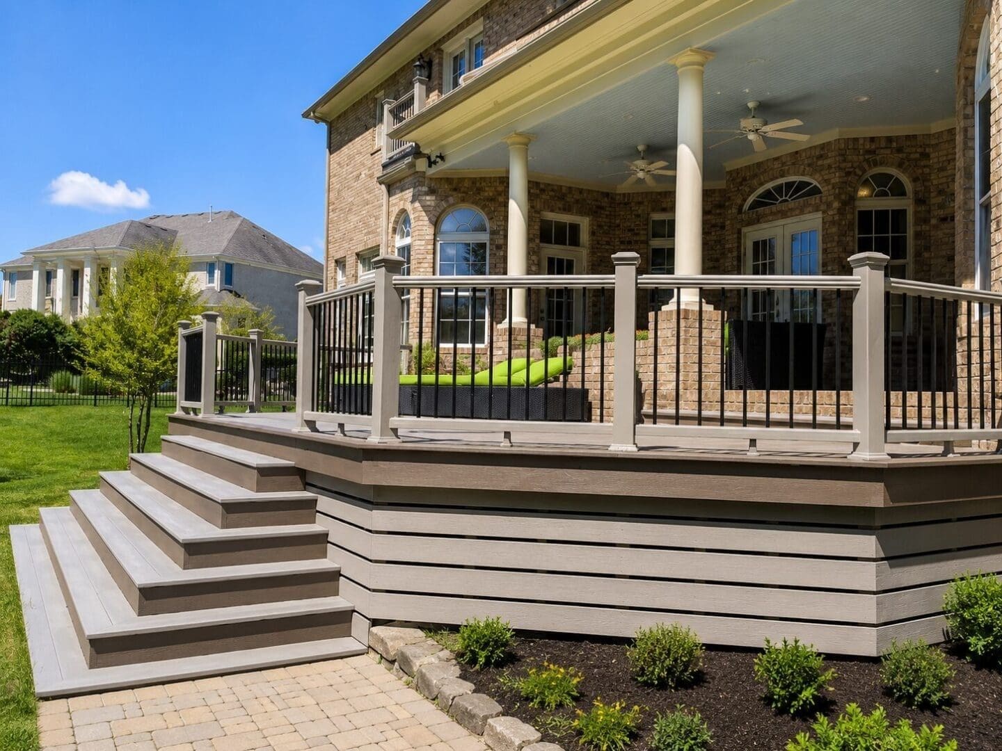 Hampton Roads deck with white railing and stairs built by B&B Decks